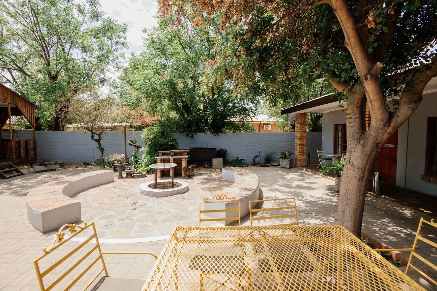 The garden and braai place — Kalahari Cottage
