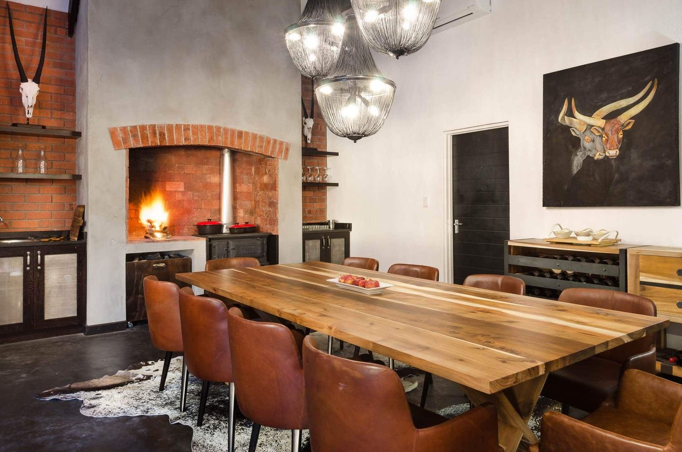 The dining room and fireplace — Kalahari Farmstead & Cottage