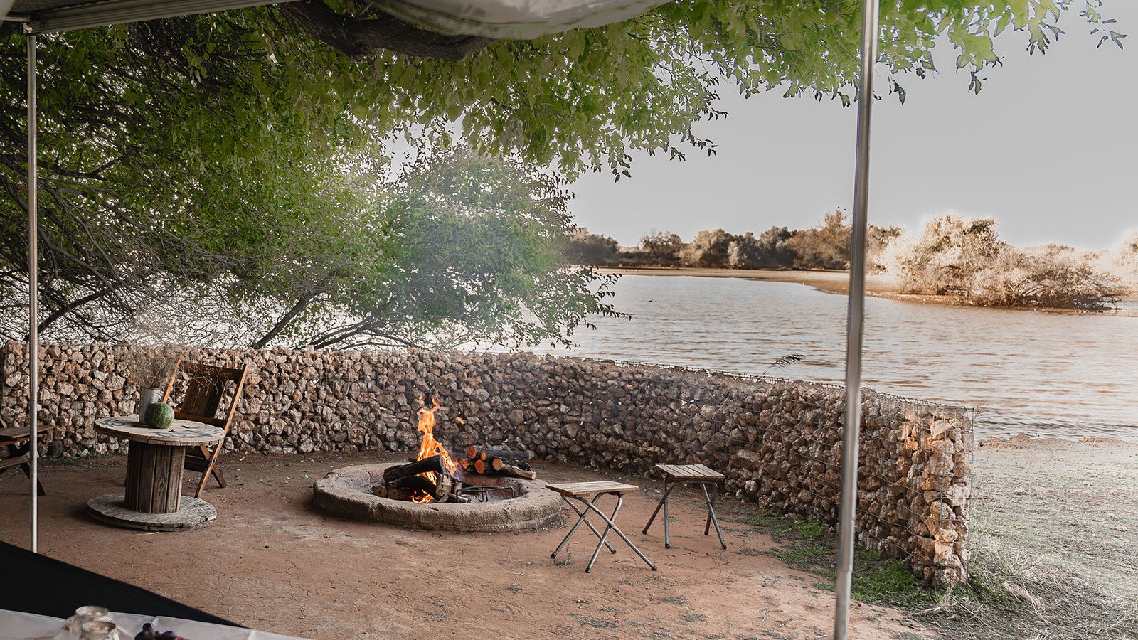 Fire on the riverbank — Kalahari Guesthouse & Farmstall