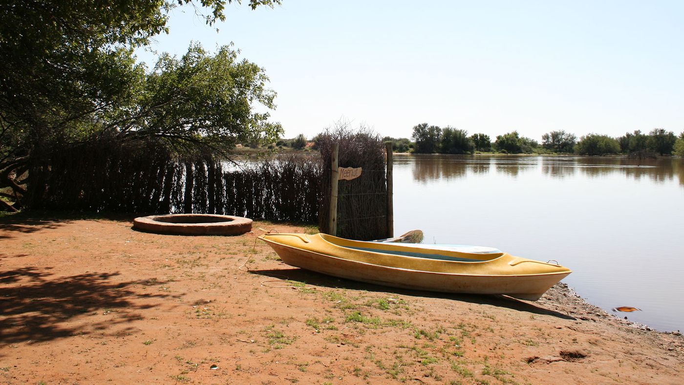 The river and the boat — Kalahari Guesthouse & Farmstall