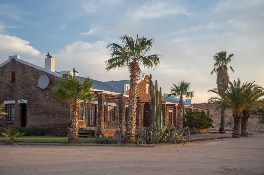 The guest house and the palms — Rooipan Guest House